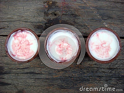 Three lassi on wooden board Stock Photo