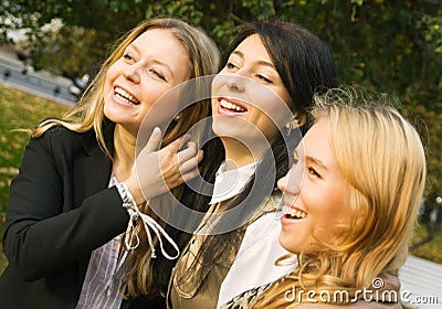 Three laughing girls Stock Photo