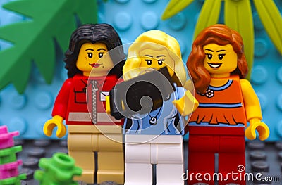 Three Lego girl make selfie Editorial Stock Photo