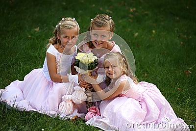 Three little cute bridesmaids Stock Photo