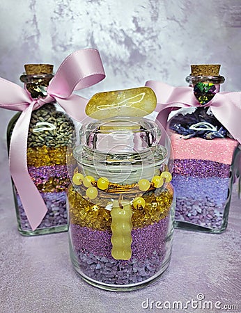 Magic jar with dreams, glitter, crystals, purple stones and lavender Stock Photo