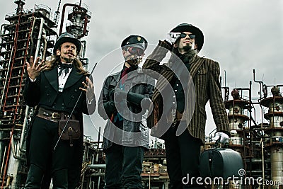 Three mans in steampunk style Stock Photo