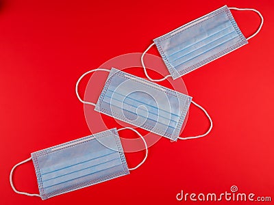 Three masks on red. Stock Photo