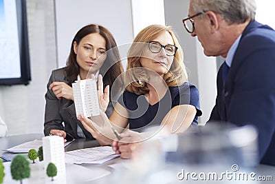 Three mature architects at work Stock Photo