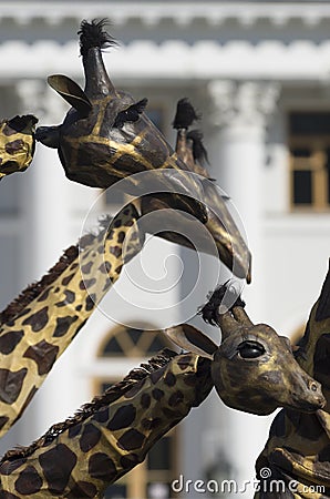 Three mechanical giraffes in the background of Elagin Palace Editorial Stock Photo