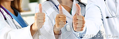 Three medicine doctor hands showing OK or approval sign Stock Photo