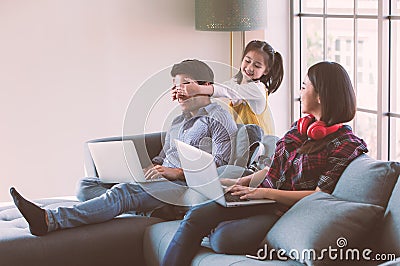 Three member of family working together Stock Photo