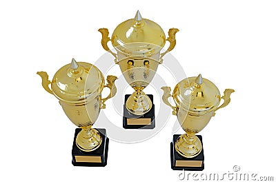 Three metal award cups of different height of gold color Stock Photo