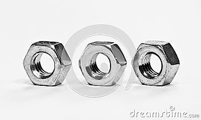 Three metal nuts Stock Photo