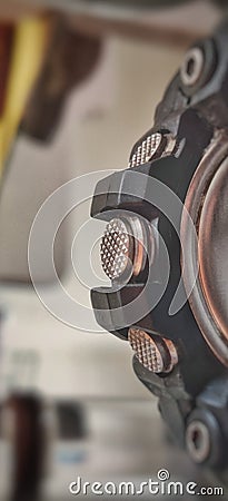 The three mettalic buttons of a watch side.wallpaper type Stock Photo