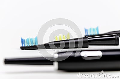 Three modern electric toothbrush heads, caries, fresh breath. Stock Photo