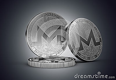 Three Monero cryptocurrency physical concept coin on gently lit dark background. Editorial Stock Photo