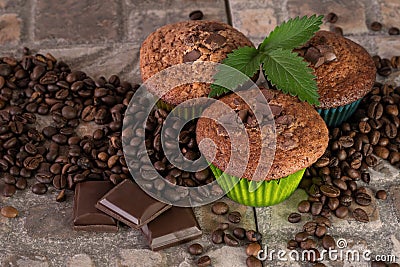 Three muffins with a green sprig Stock Photo