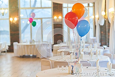 Three multi-colored balloons on holiday. Close-up balloons at an event Stock Photo