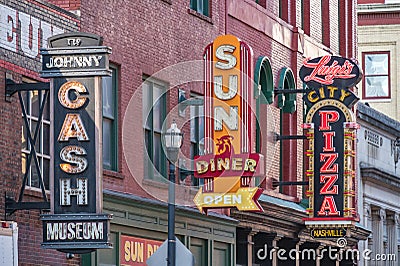 Three neon signs in downtown Nashville, Tennessee Editorial Stock Photo