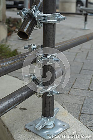 Three new scaffold double fix clamp and scaffold pipes for build the temporary structure Stock Photo