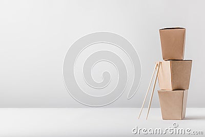 three noodles boxes with chopsticks Stock Photo