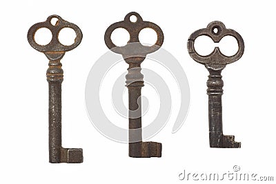 Three old antique keys on white background Stock Photo