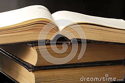 Three old big books Stock Photo