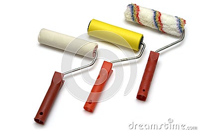 Three paint rollers Stock Photo