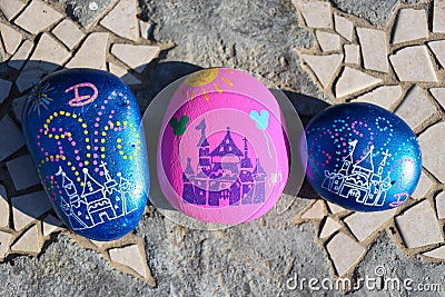 Three painted rocks resembling the castle at Disneyland Editorial Stock Photo