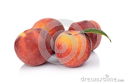 Three peaches with leaf isolated on white Stock Photo