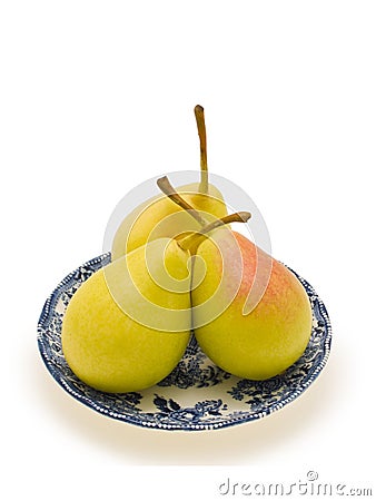 Three Pears in the saucer Stock Photo