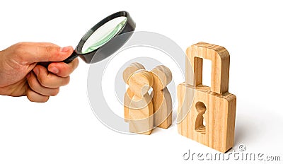 Three people with a lock. Wooden people with padlocks. Security and safety, collateral, loan for a mortgage. Confiscation of Stock Photo