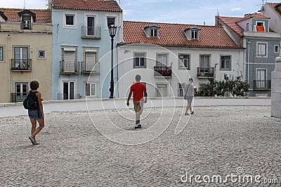 Three people sightseeing around Lisbon Editorial Stock Photo