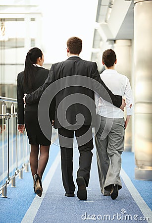 Three persons office space sexual harrasment Stock Photo