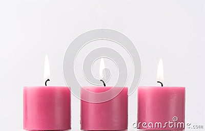 Three pink candles Stock Photo