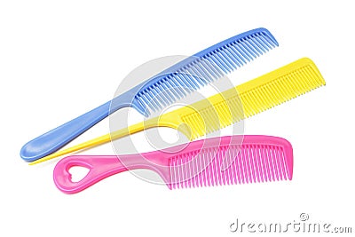 Three plastic combs with handles Stock Photo