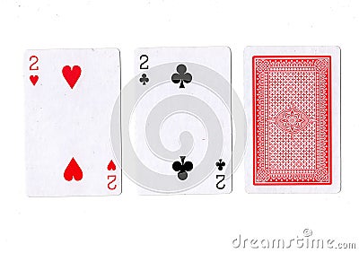 Three playing cards with a pair of twos revealed. Stock Photo