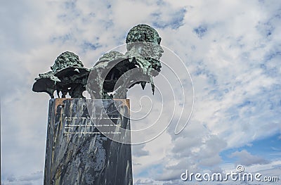 The three poets sculpture at Autonomy Bridge roundabout. By scu Editorial Stock Photo