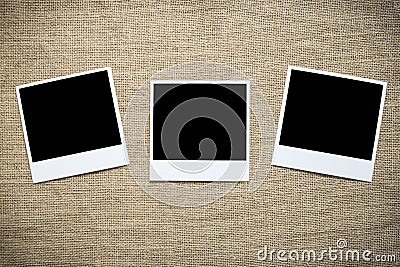 Three polaroid photos on sackcloth Stock Photo
