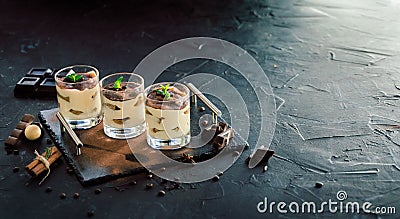 Three portions of sweet tiramisu in glass Stock Photo