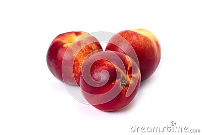 Three red bald peaches on white background. Peaches closeup red color Stock Photo