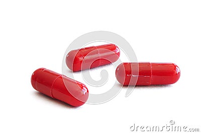 Three Red Pills (Capsules) Stock Photo