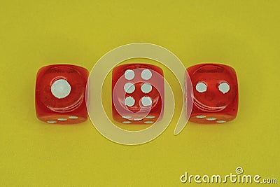 Three red plastic game cubes Stock Photo
