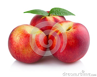 Three ripe peach (nectarine) fruits isolated Stock Photo