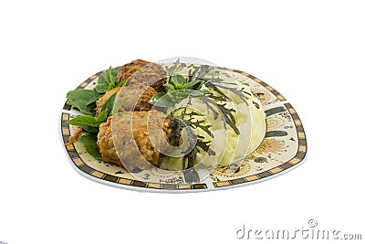 Three rissoles with mashed potatoes and salad isolated Stock Photo