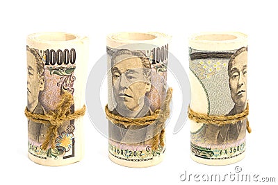 Three Roll Up Of Money Yen Banknote On White Background Stock Photo