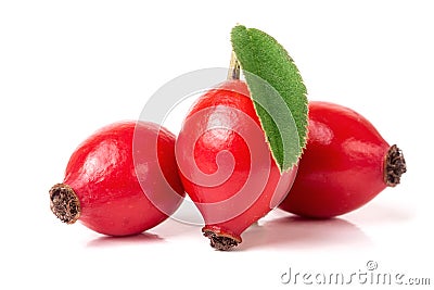 Three rose hip berry with leaf isolated on white background Stock Photo