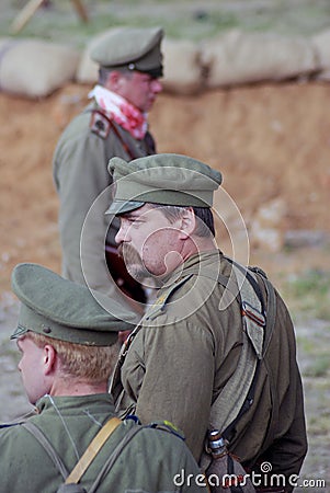 Three Russian soldiers-reenactors. Editorial Stock Photo