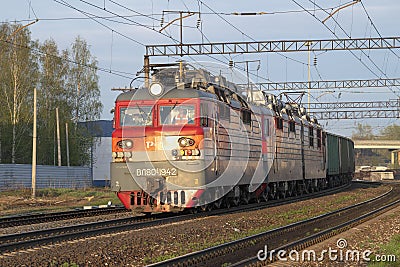 Three-section Soviet electric locomotive VL80S with a freight train Editorial Stock Photo