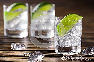 Three shots with gin and tonic Stock Photo