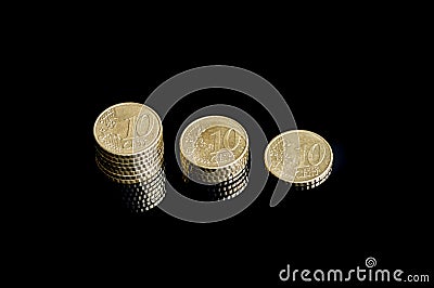 Three shrinking stacks of euro cent coins close-up Stock Photo