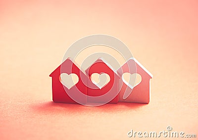 Three small houses with heart Stock Photo