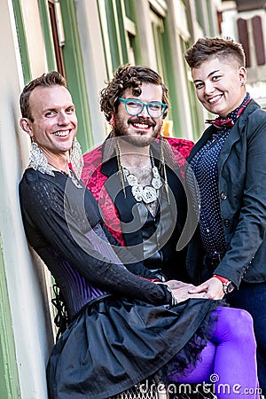 Three Smiling Gender Fluid Friends Stock Photo