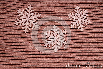 three snowflakes on a wooden floor stacked Stock Photo